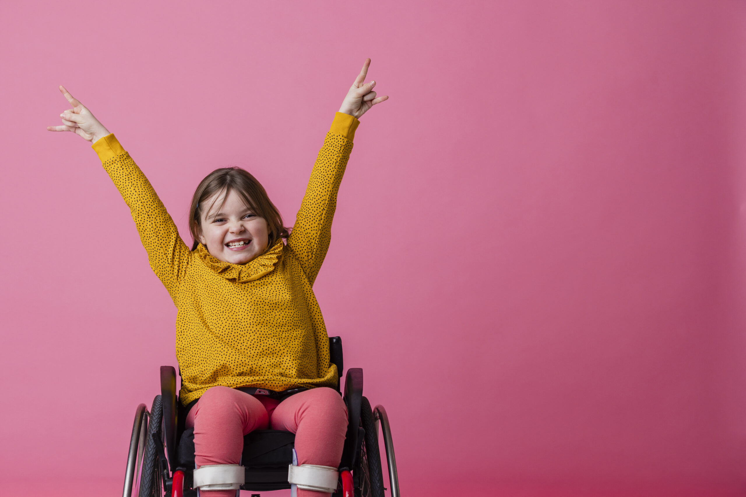 adolescent girl in wheelchair